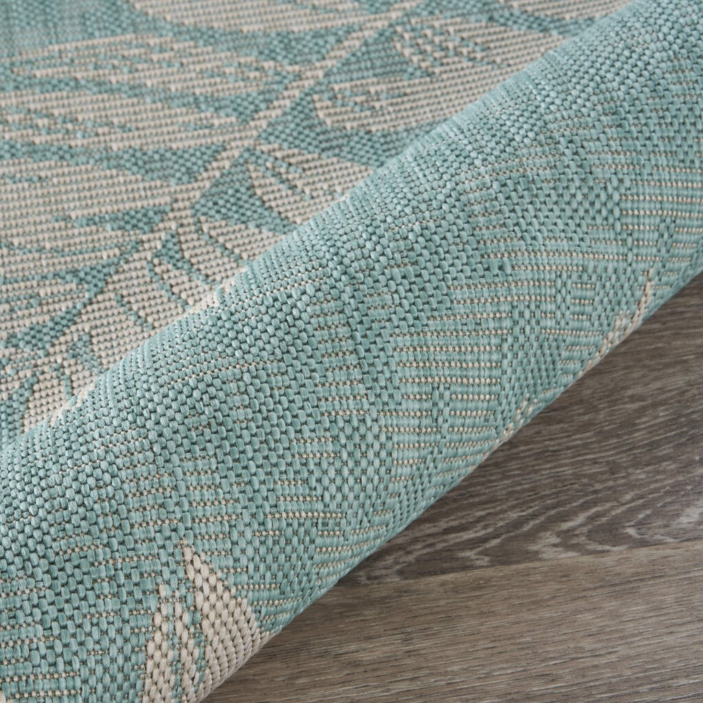 5' x 7' Teal and Ash Sprigs Indoor Outdoor Area Rug